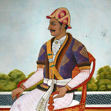 Das Gemälde zeigt Bhimasena Thapa. Der Mann sitzt auf einem prächtigen Stuhl. 